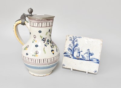 Lot 143 - A Continental Faience Jug, 18th century, with...