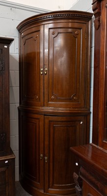 Lot 1285 - A George III Bow-Fronted Oak Standing Corner...