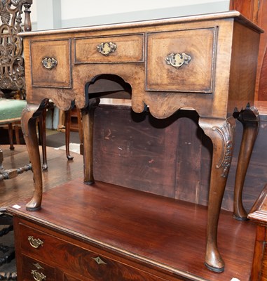 Lot 1362 - A Crossbanded Walnut Low Boy in George II...