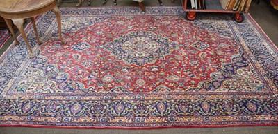 Lot 1254 - Kashan Carpet, the raspberry field centred by...