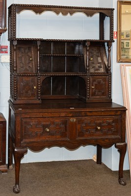 Lot 1209 - A Carved Oak Dresser, in 17th century style,...
