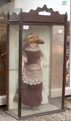 Lot 190 - A 19th Century Wax Faced Doll in Victorian...