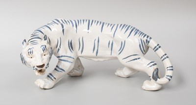 Lot 111 - A Japanese Tin Glazed Earthenware Model of a...