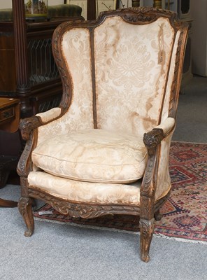 Lot 1244 - An Early 19th Century Carved Fruitwood French...