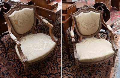 Lot 1448 - A Pair of Carved French Walnut Fauteuils
