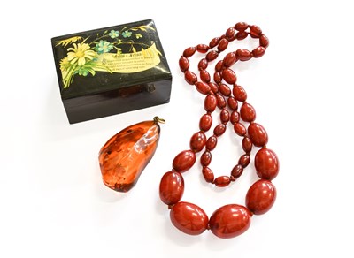Lot 411 - An Amber Type Bead Necklace, length 83cm; and...