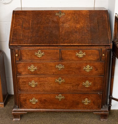 Lot 1208 - A George III Oak and Mahogany Bureau, with...