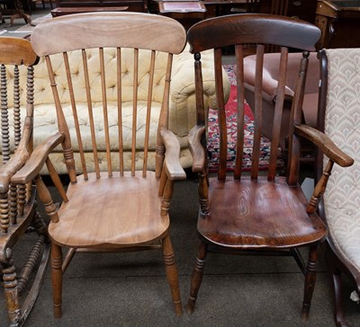 Lot 1282 - A 19th Century Stained Elm Comb Back Windsor...