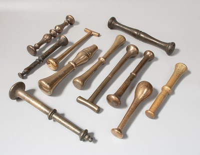 Lot 284 - A Collection of Eleven Bronze Pestles,17th...
