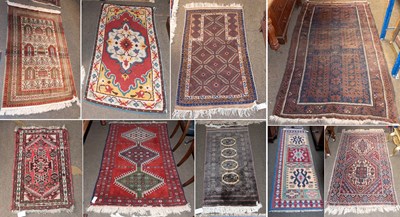 Lot 1251 - Anatolian Rug, the brick red field centred by...
