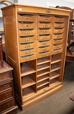 Lot 1327 - An Early 20th Oak Tambour Fronted Cabinet by...