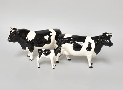 Lot 14 - A Beswick Friesian Bull, Cow and Calf (3)