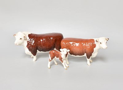 Lot 12 - Beswick Hereford Bull, Cow and Calf (3)