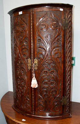 Lot 1336 - 19th Century Carved Oak Bow Fronted Hanging...