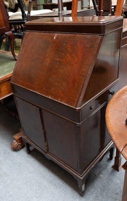 Lot 1300 - A 1950s Mahogany Bureau Cocktail Cabinet, with...
