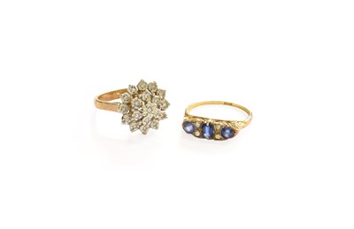 Lot 424 - A Sapphire and Diamond Seven Stone Ring,...