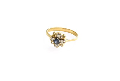 Lot 432 - An 18 Carat Gold Sapphire and Diamond Cluster...