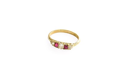 Lot 400 - A Ruby and Diamond Five Stone Ring, two...