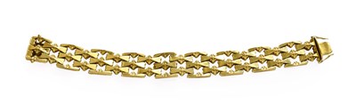 Lot 413 - A 9 Carat Gold Fancy Link Bracelet, three rows...