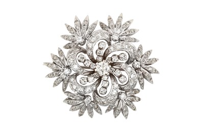 Lot 2387 - A Diamond Brooch the central round brilliant...