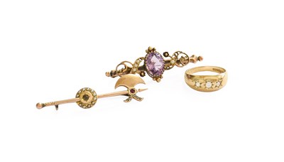 Lot 441 - A 9 Carat Gold Diamond Three Stone ring,...