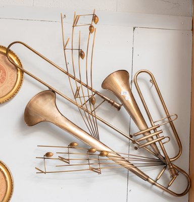 Lot 210 - A Curtis Jeré Style Musical Brass Wall...