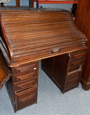 Lot 1373 - A 1920s Oak Rolltop Desk, 109cm by 78cm by 116cm