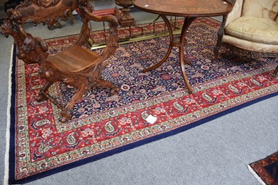 Lot 1114 - Tabriz Carpet, the indigo field of meandering...