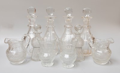 Lot 343 - A Set of Four Cut Glass Decanters, together...