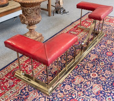 Lot 1245 - A Brass and Red Leather Club Fender, 163cm by...