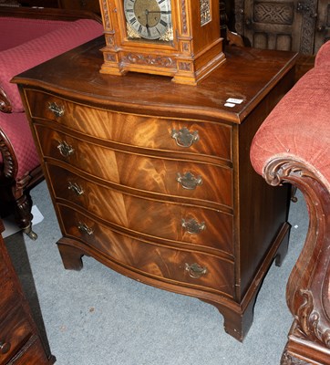 Lot 1357 - A Reprodux Mahogany Serpentine Fronted Four...