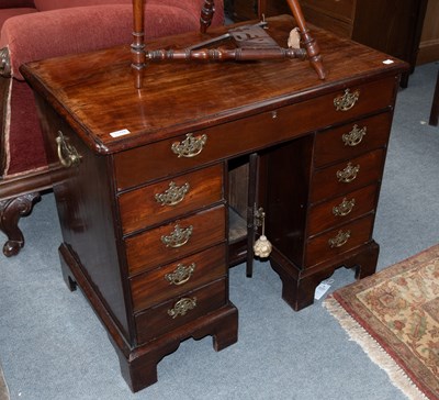 Lot 1359 - A George III Mahogany Kneehole Desk, the...