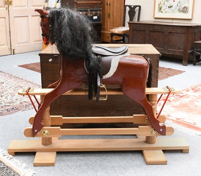 Lot 1224 - A Painted Rocking Horse on Oak Trestle Base,...