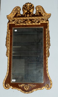 Lot 1289 - A George III Style Parcel-Gilt Mahogany Wall...