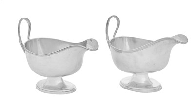 Lot 858 - A Pair of George VI Silver Sauceboats