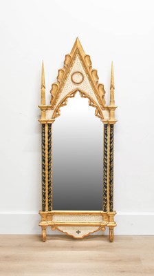 Lot 221 - A Reproduction Giltwood and Ebonised Mirror,...