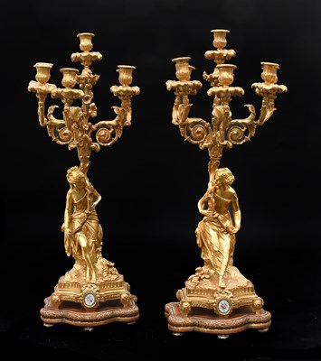 Lot 1104 - A Pair of French Figural Gilt Bronze Six Light...