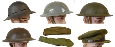 Lot 255 - Two British Second World War Brodie Helmets,...