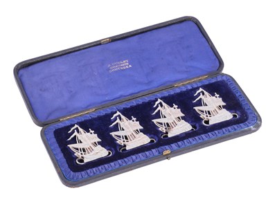 Lot 821 - A Cased Set of Four Victorian Silver Place-Card Holders