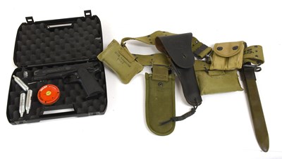Lot 239 - A Second World War US Army Webbing Waist Belt,...