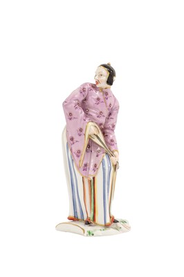 Lot 44 - A Nymphenburg Porcelain Chinoiserie Figure,...