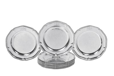 Lot 2451 - A Set of Twelve George III Silver Dinner-Plates