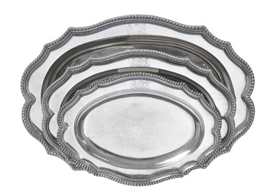 Lot 2449 - A Graduated Set of Three George III Silver Meat-Dishes