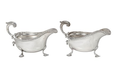 Lot 2553 - A Pair of Edward VII Silver Sauceboats