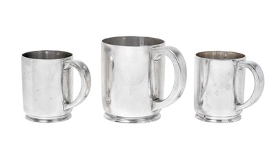 Lot 2555 - A Graduated Set of Three George VI Silver Mugs