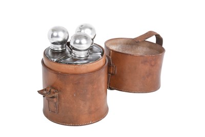 Lot 2554 - A Cased Set of Three Victorian Silver-Mounted Glass Flasks