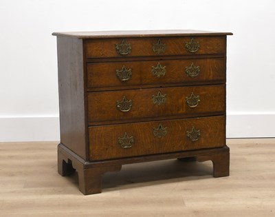 Lot 425 - A George III Oak Straight-Front Chest of...