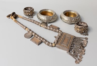 Lot 148 - An Omani Silver Amulet, Two Bangles and Two...