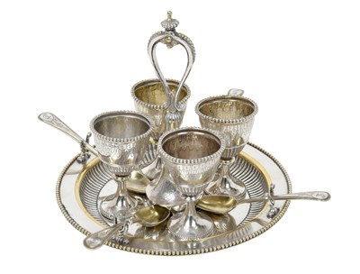 Lot 2541 - A Victorian Parcel-Gilt Silver Egg-Cruet With a Set of Four Associated Egg-Spoons