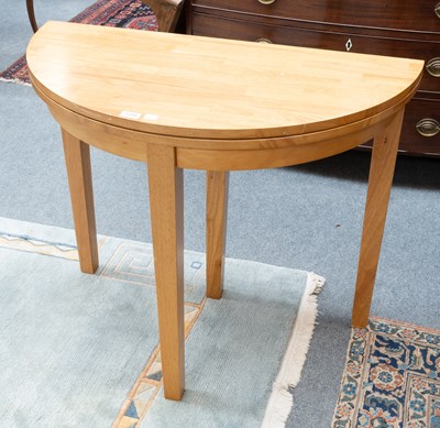 Lot 1268 - A Modern Oak Demi Lune Foldover Card Table,...